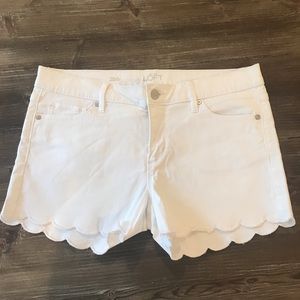 White denim shorts with scalloped trim